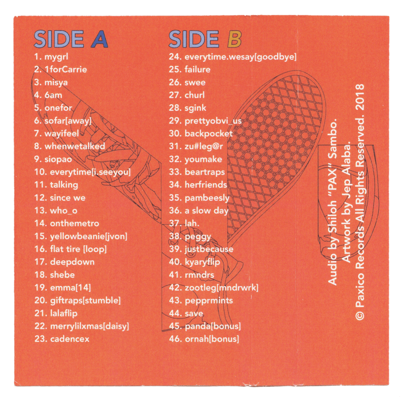 Orange Junior cassette tape insert with tracklist